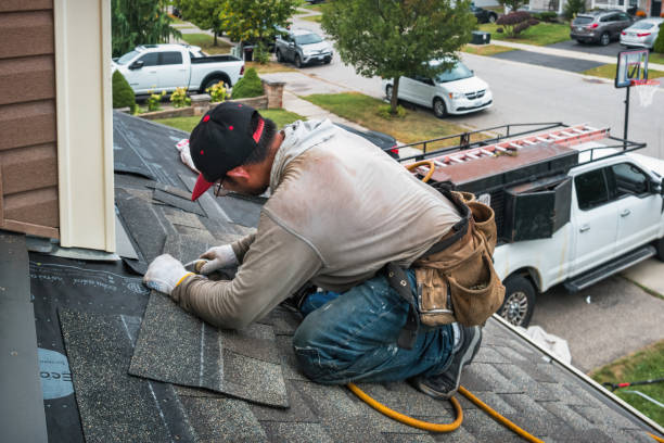 Professional Roofing technician working in Romulus, NY